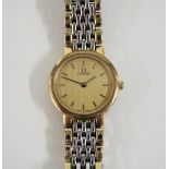 Omega DeVille ladies wristwatch, gold coloured dial with hour batons, on a bi colour stainless