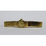 Lady's Jean Renet 9ct gold wrist watch on a textured 9ct gold strap