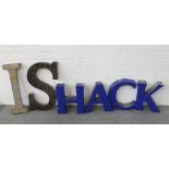 Collection of painted metal letters