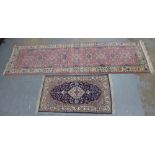 Isfahan type rug, blue field and central ivory medallion 135 x 78cm, together with a runner of