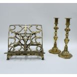 Pair of brass knop stemmed candlesticks and a brass book stand (3)