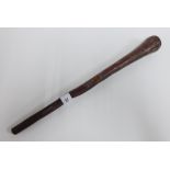 Aboriginal wooden fighting stick of tapering ribbed form, 42cm