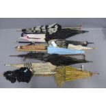 Collection of 19th and 20th century parasols, one with a bone handle (12) (a/f)