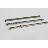 Sammy of Hong Kong, pair of Sterling silver swizzle sticks and another by Deakin & Francis,