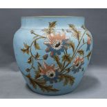 Late 19th /early 20th century planter painted with flowers to a pale blue ground. 22cm