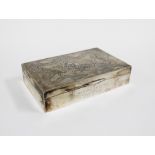 Waikee, Hong Kong, Sterling silver table cigarette box, the hinged lid engraved with a dragon