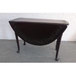 19th century carved mahogany drop leaf table. 70 x 125 x 109cm