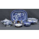 A collection of blue and white transfer printed pottery, Staffordshire pottery cruets and a copper