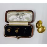 Two 9ct gold short studs and a single 18ct gold cufflink (3)