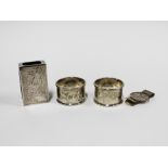 Sammy of Hong Kong, Sterling silver pair of napkin rings and matching matchbox cover and a money