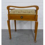 Light mahogany piano stool with shaped top rail, upholstered seat and a single drawer, 50 x 62 x