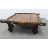 Indian wooden ox cart coffee table with chased steel and brass studded decoration. 46 x 135 x 135cm