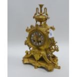 French gilt metal mantle clock with ceramic roman numerals, movement stamped H&F Paris and