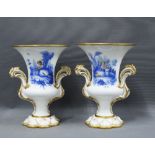 Pair of 'Sevres' campana shaped vases with children in landscapes in blue with details in flesh