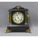 American ebonised mantle clock by Westbury Clock Co, with faux marble pilasters and lion mask