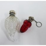 Victorian acorn shaped ruby glass scent bottle with an embossed silver cover. 6cm, together with