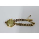 Lady's vintage Tudor wristwatch on a 9ct gold bracelet strap