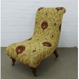 Nursing / slipper chair upholstered with contemporary floral fabric, on mahogany turned legs,