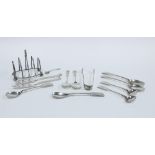 George V silver toast rack, Birmingham 1931, a pair of Edwardian silver butter knives, Sheffield