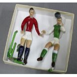 Rare blown coloured glass footballers, in Heart of Midlothian and Hibernian FC colours, one with