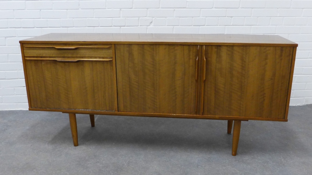 A mid 20th century walnut sideboard credenza in the manner of Morris of Glasgow, with three