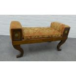Mahogany window stool/seat with upholstered arms and seat with a loose squab cushion, with gilt