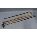 Two early 20th century Sunday golf walking sticks and two walking canes with white metal mounts (4)