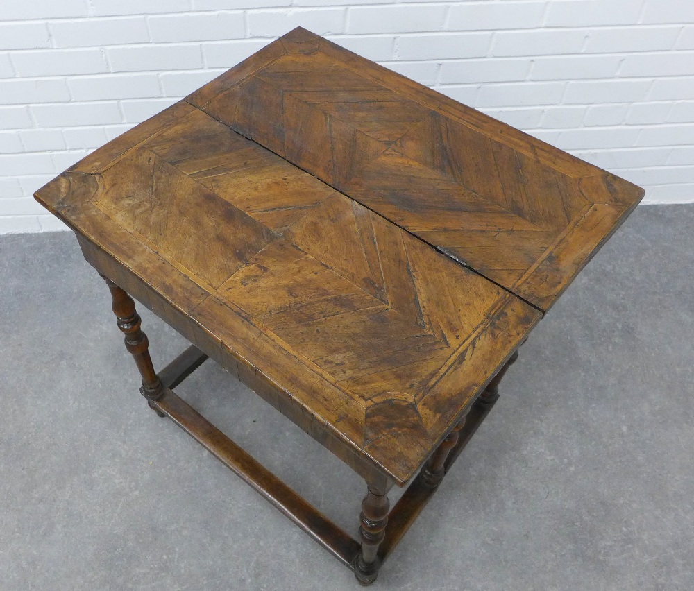 Walnut fold over gateleg table with a short drawer to each side. 74 x 75 x 66cm. (a/f with bowed - Image 2 of 4