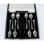 QEII cased set of twelve silver teaspoons with matching sugar tongs, Birmingham 1958