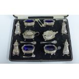 George V silver ten piece silver condiments set, Birmingham 1928, in fitted box