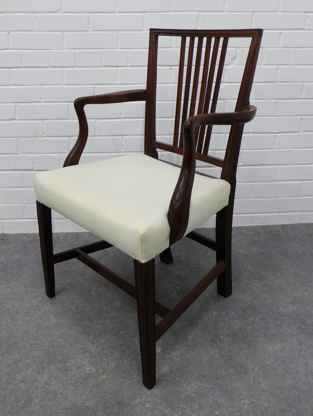 19th century mahogany open armchair with upholstered stuff over seat. 93 x 57 x 46cm.