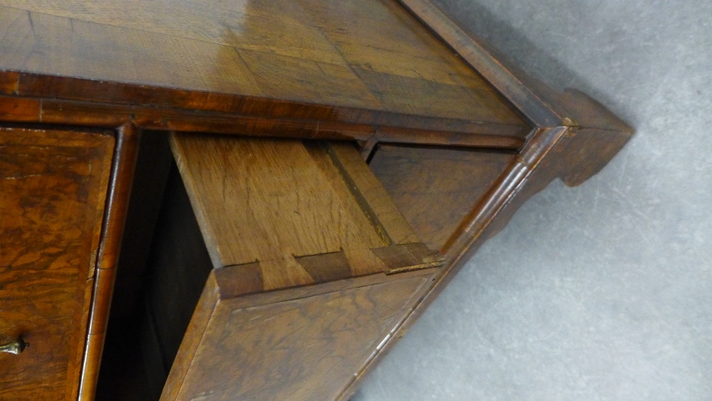 Walnut and feather banded chest with two short and three graduating long drawers, on bracket feet. - Image 4 of 4