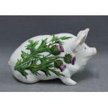 Wemyss Scottish pottery pig, hand painted with thistles pattern, (one front trotter lacking) (a/f)