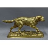 Ormolu bronze figure of a dog on naturalistic plinth base, 36cm long