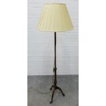 Mahogany standard lamp and shade, with hoof feet. 153cm high.
