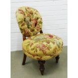 Early 20th century nursing chair with contemporary floral pattern upholstery, 71 x 45 x 37cm.
