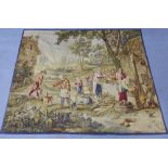 Large tapestry with a village scene with figures around a well, 275 x 235cm approx.