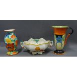 A collection of Art Deco pottery to include a vase, jug and flower bowl, (3)
