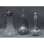 Two 19th century globe and shaft decanters with stoppers together with two Irish silver decanter