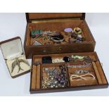 Brown jewellery box containing a collection of silver and costume jewellery together with a silver