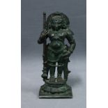 Hindu patinated bronze figure of Krishna, modelled standing on a lotus base, 14.5cm