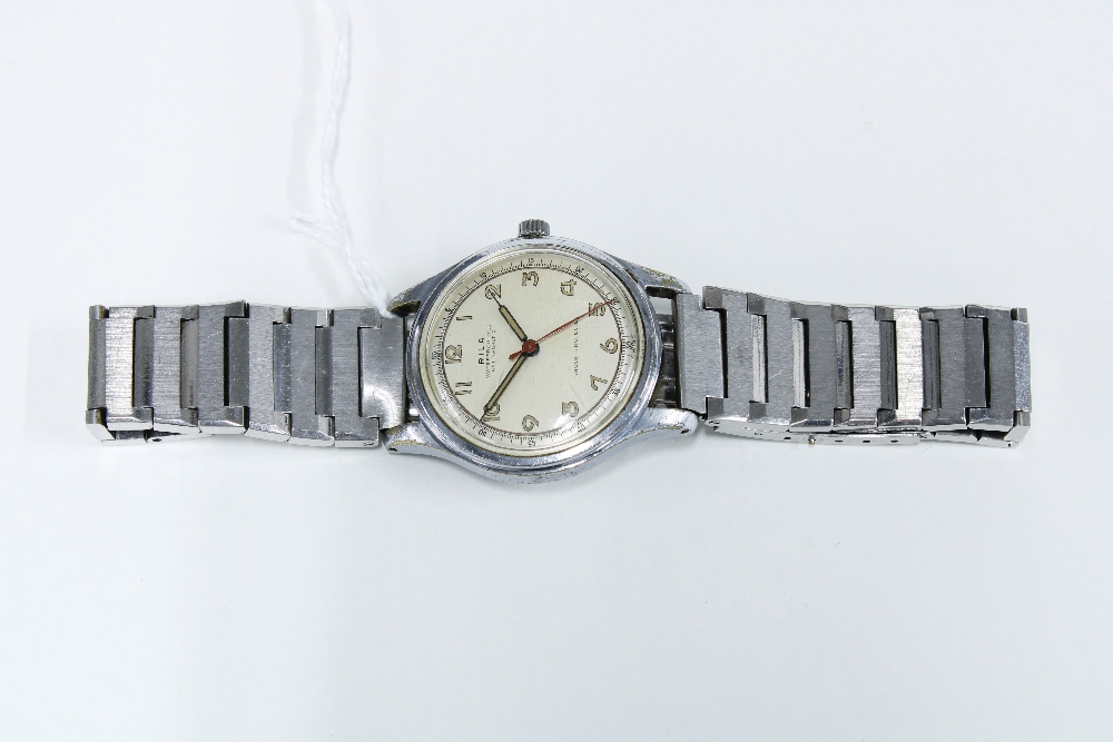 Gents vintage Rila stainless steel wristwatch with champagne dial and Arabic numerals with outer