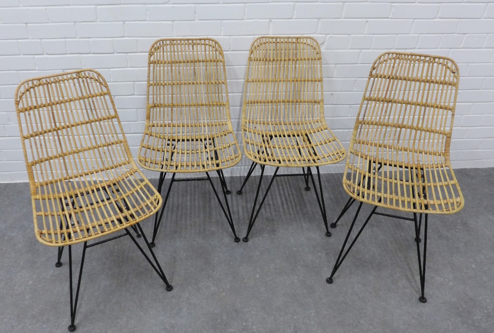 Set of four canework basket chairs on black metal hairpin legs. 80 x 45 x 40cm. (4)