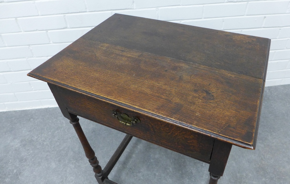 Oak table with square top having a moulded edge, over a single long drawer with brass handle, on - Image 2 of 3