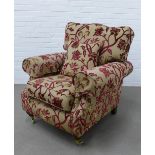 Martin & Frost floral upholstered armchair with loose cushions and armrest covers, together with a