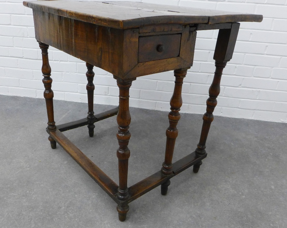 Walnut fold over gateleg table with a short drawer to each side. 74 x 75 x 66cm. (a/f with bowed - Image 3 of 4