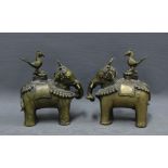 A pair of Indian bronze elephant Temple oil lamp / incense burners, the hinged covers in the form of