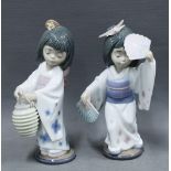 Two Lladro Japanese girl figures, one with a lantern and the other with two fans, No. 6230 & 6231,