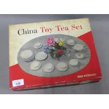 Childs vintage china toy tea set in willow pattern, with original box