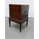 Georgian mahogany cellarette box on stand, with brass side handles, 59 x 36cm.